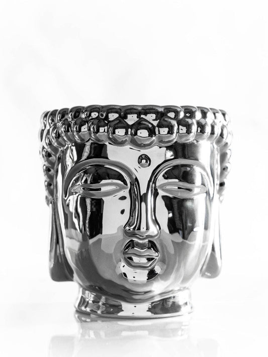 This 40oz Metallic Buddha scented candle is hand-sculpted and hand-poured in the USA with only the finest essential oils and 3 lead-free cotton wicks that provide a clean burn. 