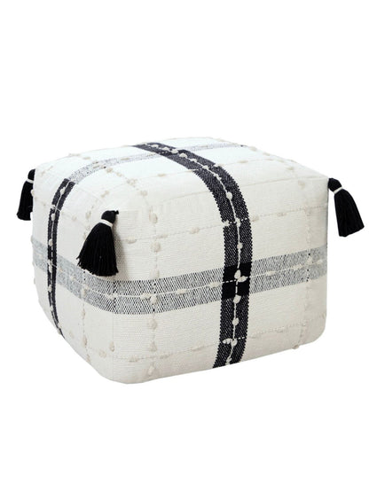 The Mazie Pouf In Black & Ivory is Upholstered in a fabric blend that is handcrafted by skilled weavers, 