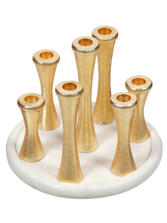7 Individual Gold Brass Candle Holders On a 10 inch Round Marble Base, Sold by KYA Home Decor.