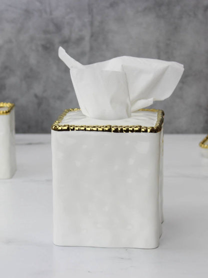 White Porcelain Square Tissue Box with Gold Beaded Edges Sold by KYA Home Decor.