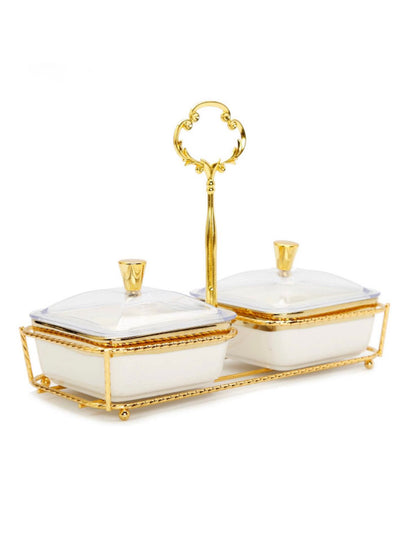 Bring sheer elegance to the table with this porcelain relish dish featuring 2 bowls on a gold base. The white bowls are enhanced by an elegant gold sculpting along the base and middle It includes covers to ensure a spill-free serving experience. 